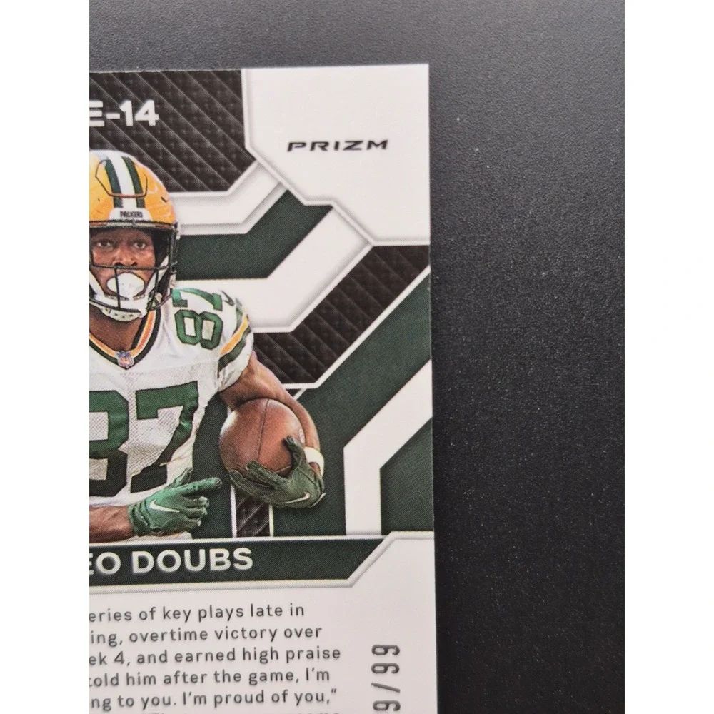 2022‎ Panini Prizm Romeo Doubs #E-14 Emergent Blue Ice Prizm /99 (RC) Packers